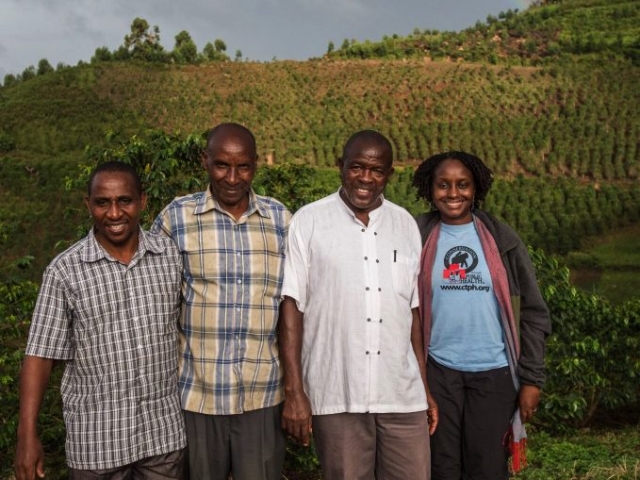 Dr. Gladys with members of Bwindi Coffee Growers Cooperative. Photo Jo-Anne MacArthur, Unbound Project